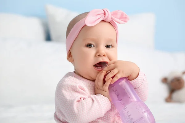 Cute Little Baby Drinking Water Bottle Bed Room Closeup — Stock Photo, Image