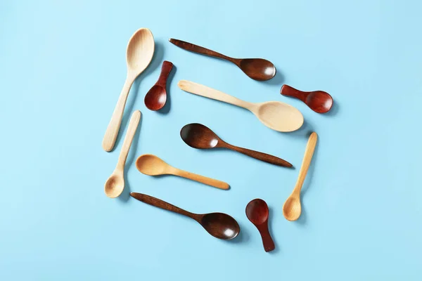 Different Wooden Spoons Color Background — Stock Photo, Image