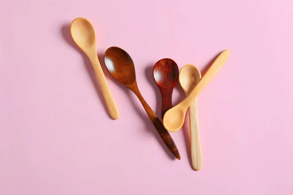 Different Wooden Spoons Color Background — Stock Photo, Image