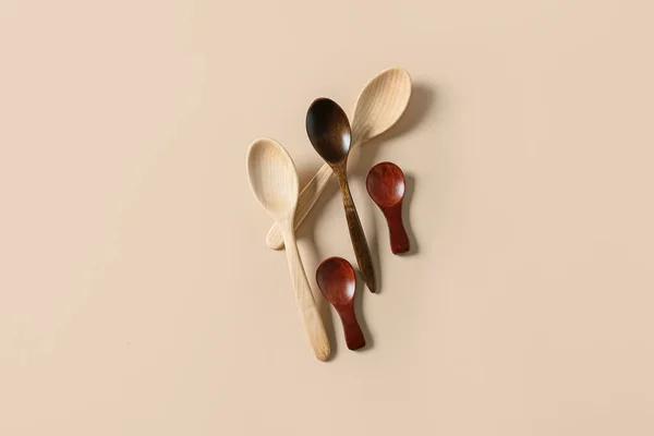 Different Wooden Spoons Light Background — Stock Photo, Image