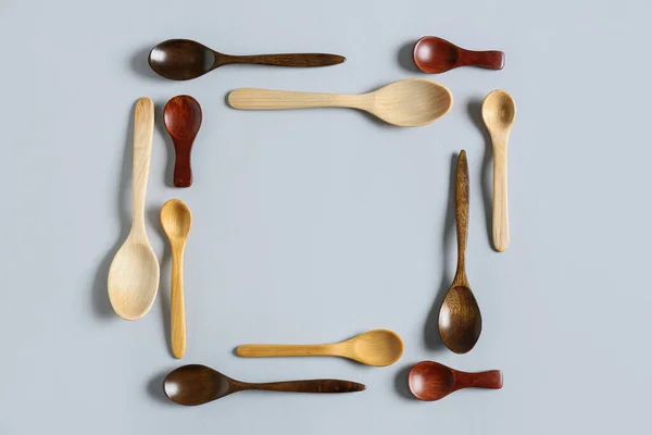 Frame Made Wooden Spoons Light Background — Stock Photo, Image