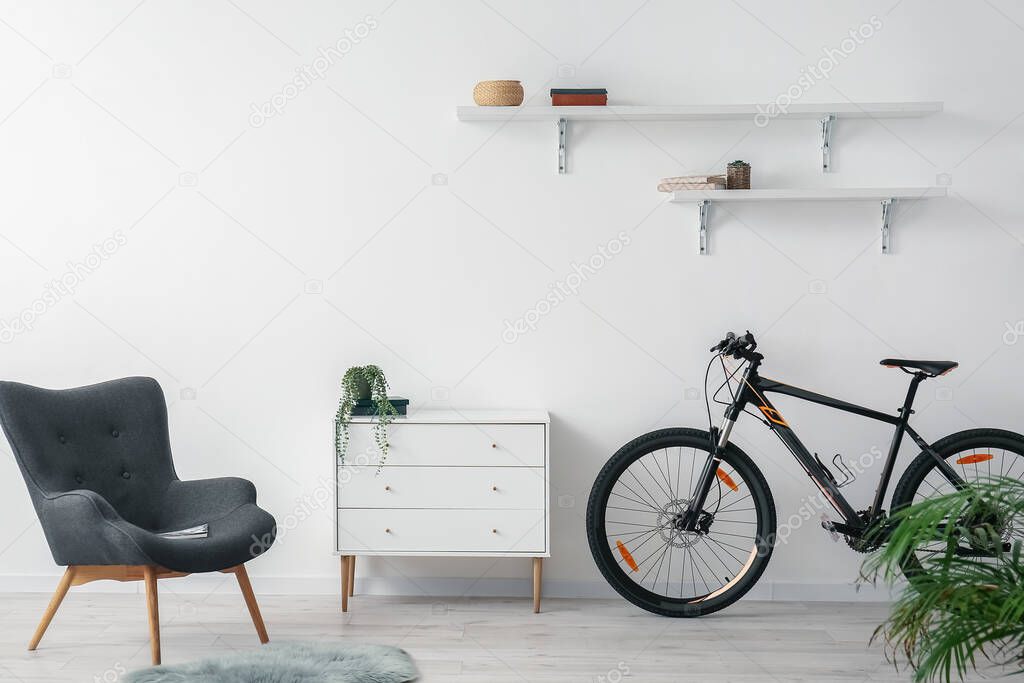 Modern bicycle in interior of living room