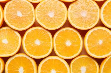 Arkaplan olarak taze portakal parçaları