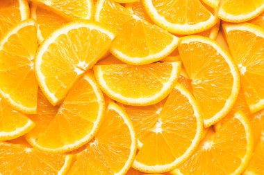 Arkaplan olarak taze portakal parçaları