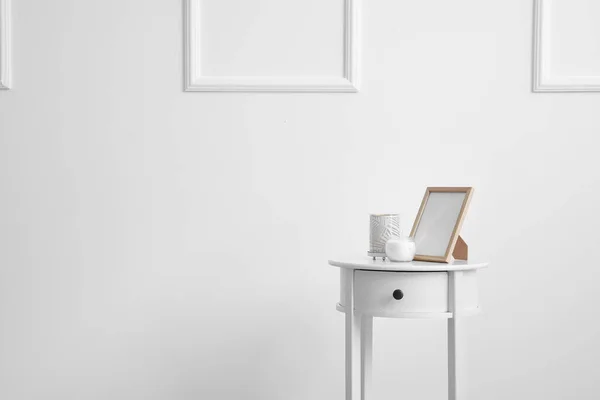 Bedside Table Photo Frame Candles White Wall — Stock Photo, Image