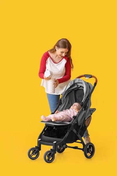 Woman Her Cute Baby Stroller Color Background — Stock Photo, Image