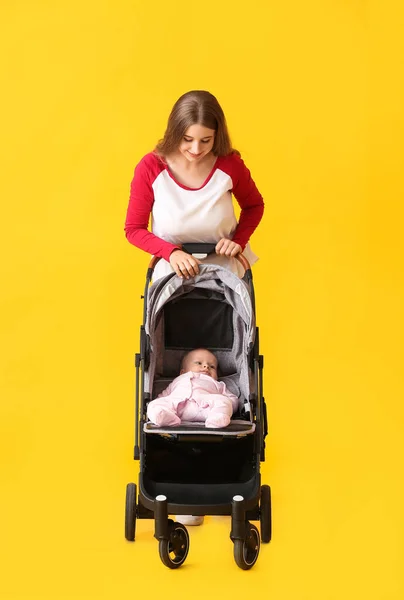 Woman Her Cute Baby Stroller Color Background — Stock Photo, Image