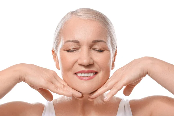 Mature Woman Giving Herself Face Massage White Background — Stock Photo, Image