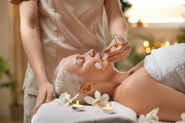 Mature Woman Receiving Face Massage Beauty Salon — Stock Photo, Image