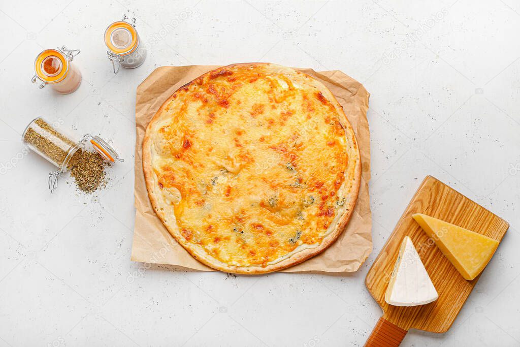 Tasty cheese pizza on light background