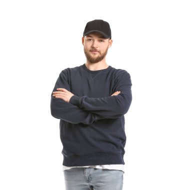 Beyaz arka planda yakışıklı bir gencin portresi.