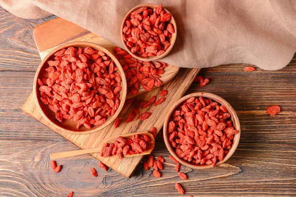 Bowls Scoop Dried Goji Berries Wooden Background — Stock Photo, Image