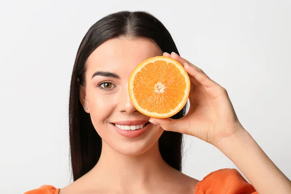 Beautiful Young Woman Orange Light Background — Stock Photo, Image