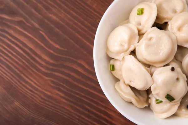Skål Med Välsmakande Dumplings Trä Bakgrund — Stockfoto