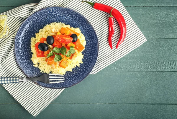 Plate Tasty Couscous Color Wooden Background — Stock Photo, Image