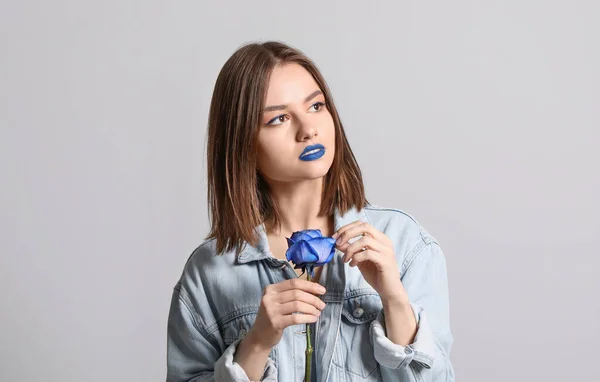 Stylish Young Woman Blue Rose Grey Background — Stock Photo, Image