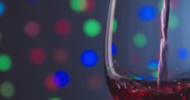 Pouring Red Wine Glass Color Background Closeup — Stock Video