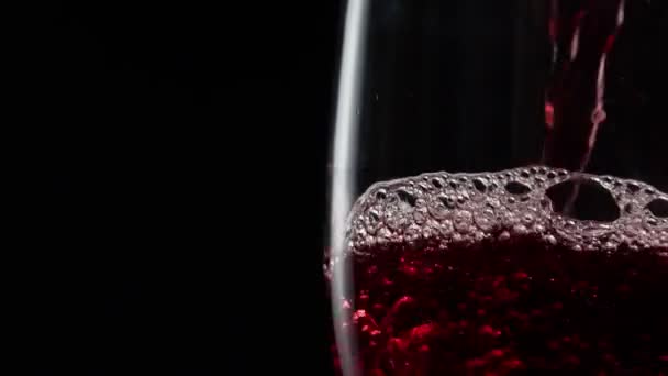 Pouring Red Wine Glass Dark Background Closeup — Stock Video