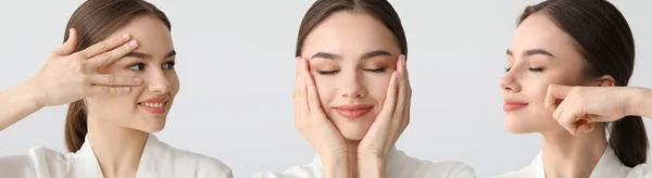 Young Woman Giving Herself Face Massage Light Background — Foto de Stock