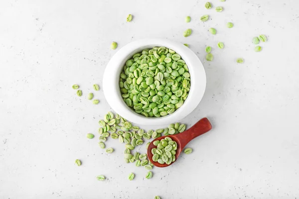 Bowl Spoon Green Coffee Beans Light Background — Stock Photo, Image