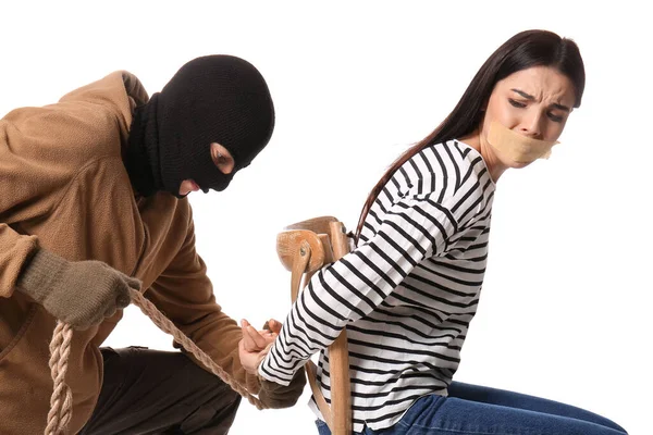 Terrorist Tying Female Hostage Chair White Background — Stock Photo, Image