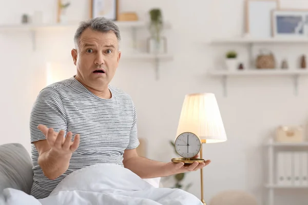 Confused Mature Man Alarm Clock Bedroom — Stock Photo, Image