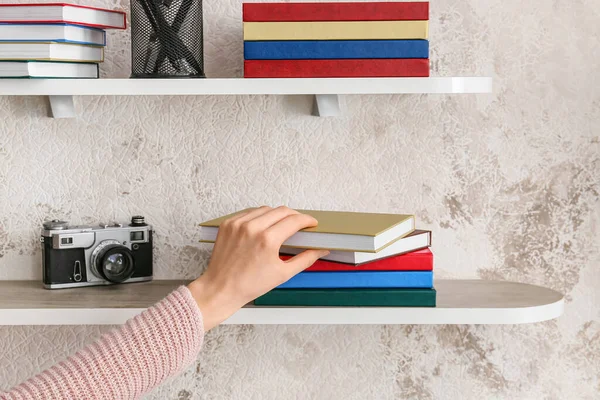 Woman Taking Book Shelf Closeup — Stock Photo, Image