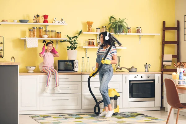 Mother Daughter Having Fun While Hoovering Carpet Kitchen — Stock Photo, Image