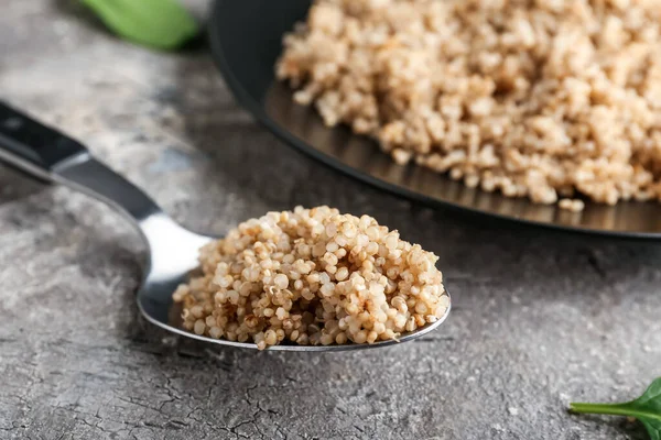 Plate Tasty Quinoa Spoon Grey Background Closeup — Stock Photo, Image