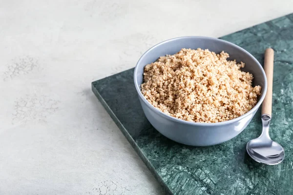 Bowl Tasty Quinoa Spoon Light Background — Stock Photo, Image