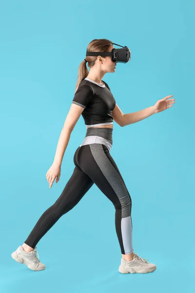 Sporty Young Woman Virtual Reality Glasses Training Color Background — Stock Photo, Image