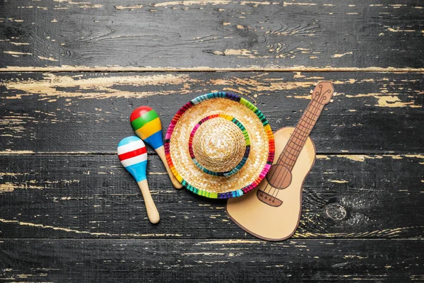 Mexican Sombrero Maracas Drawn Guitar Dark Wooden Background — Foto de Stock
