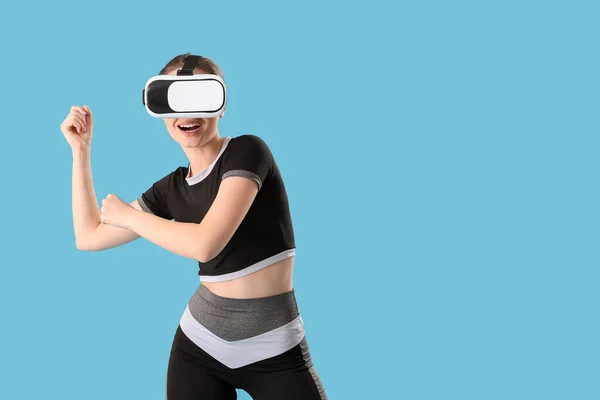 Sporty Young Woman Virtual Reality Glasses Training Color Background — Stock Photo, Image