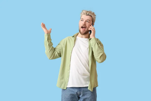 Young Man Talking Mobile Phone Color Background — Stock Photo, Image