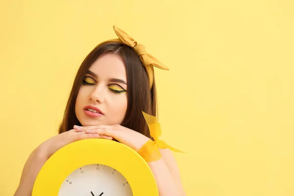 Stylish Young Woman Clock Yellow Background — Stock Photo, Image