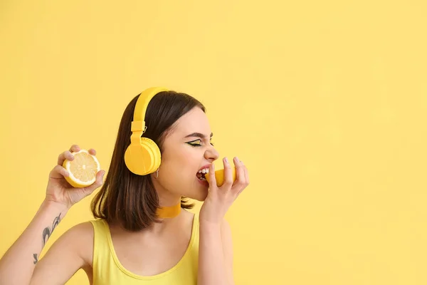 Stylish Young Woman Headphones Lemon Yellow Background —  Fotos de Stock