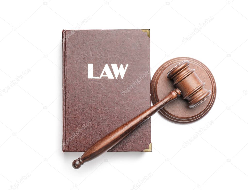 Judge's gavel and law book on white background