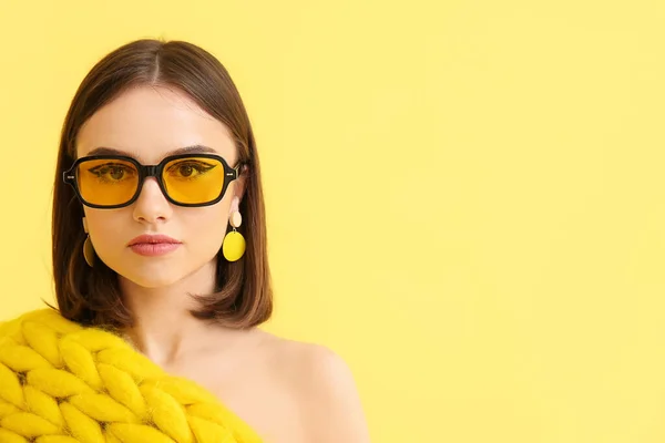 Stylish Young Woman Knitted Plaid Sunglasses Yellow Background — Stock Photo, Image