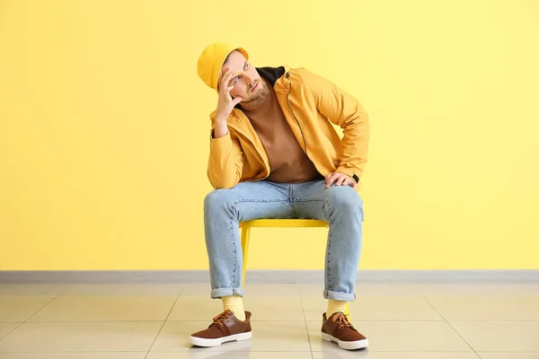 Stylish Young Man Sitting Chair Yellow Wall — Stock Photo, Image