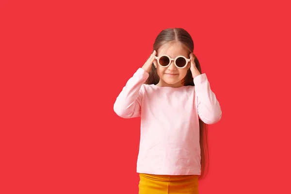 Cute Little Girl Wearing Stylish Sunglasses Color Background — Stock Photo, Image