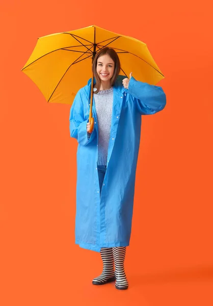 Stylish Young Woman Raincoat Umbrella Showing Thumb Color Background — Stock Photo, Image