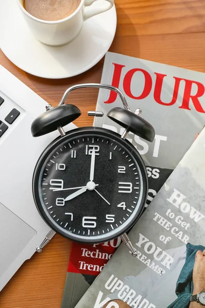 Alarm Clock Magazines Wooden Background — Foto de Stock