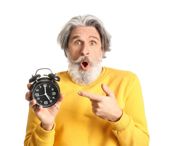 Senior Man Pointing Alarm Clock White Background — Stock Photo, Image