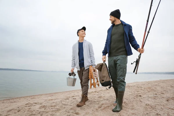 Father Son Fishing Equipment Walking Riverside — Stock Photo, Image