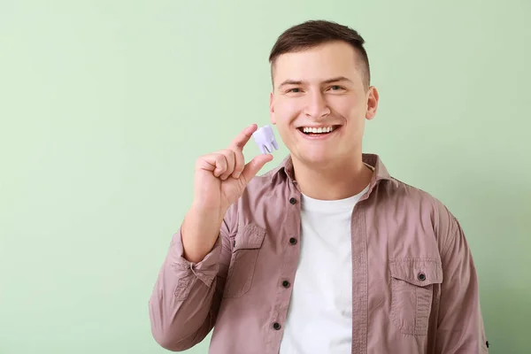 Young Man Plastic Tooth Color Background — Stock Photo, Image