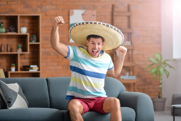 Happy Man Sombrero Hat Sitting Sofa Room — Stock Photo, Image