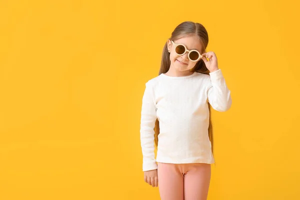 Cute Little Girl Wearing Stylish Sunglasses Color Background — Stock Photo, Image