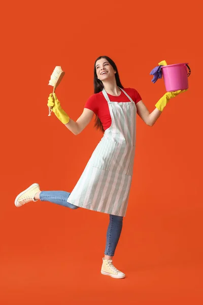 Young Woman Cleaning Supplies Color Background — Stock Photo, Image