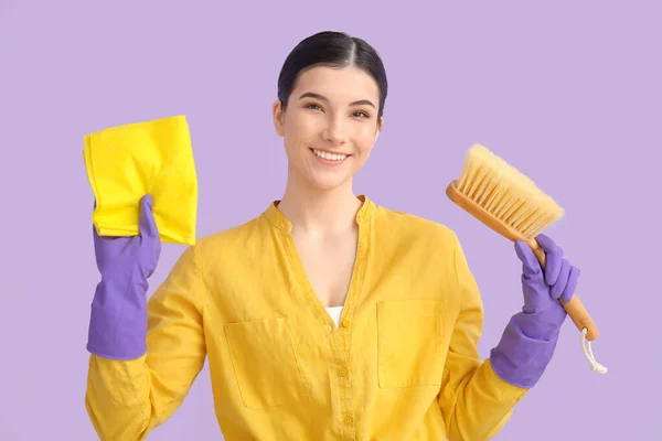 Young Woman Cleaning Supplies Color Background — Stock Photo, Image