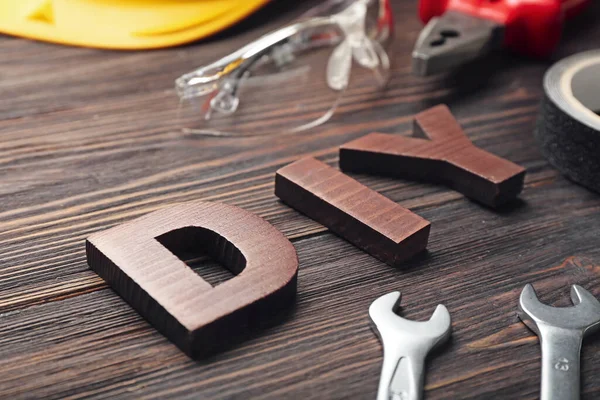 Set Tools Word Diy Wooden Background Closeup — Stock Photo, Image